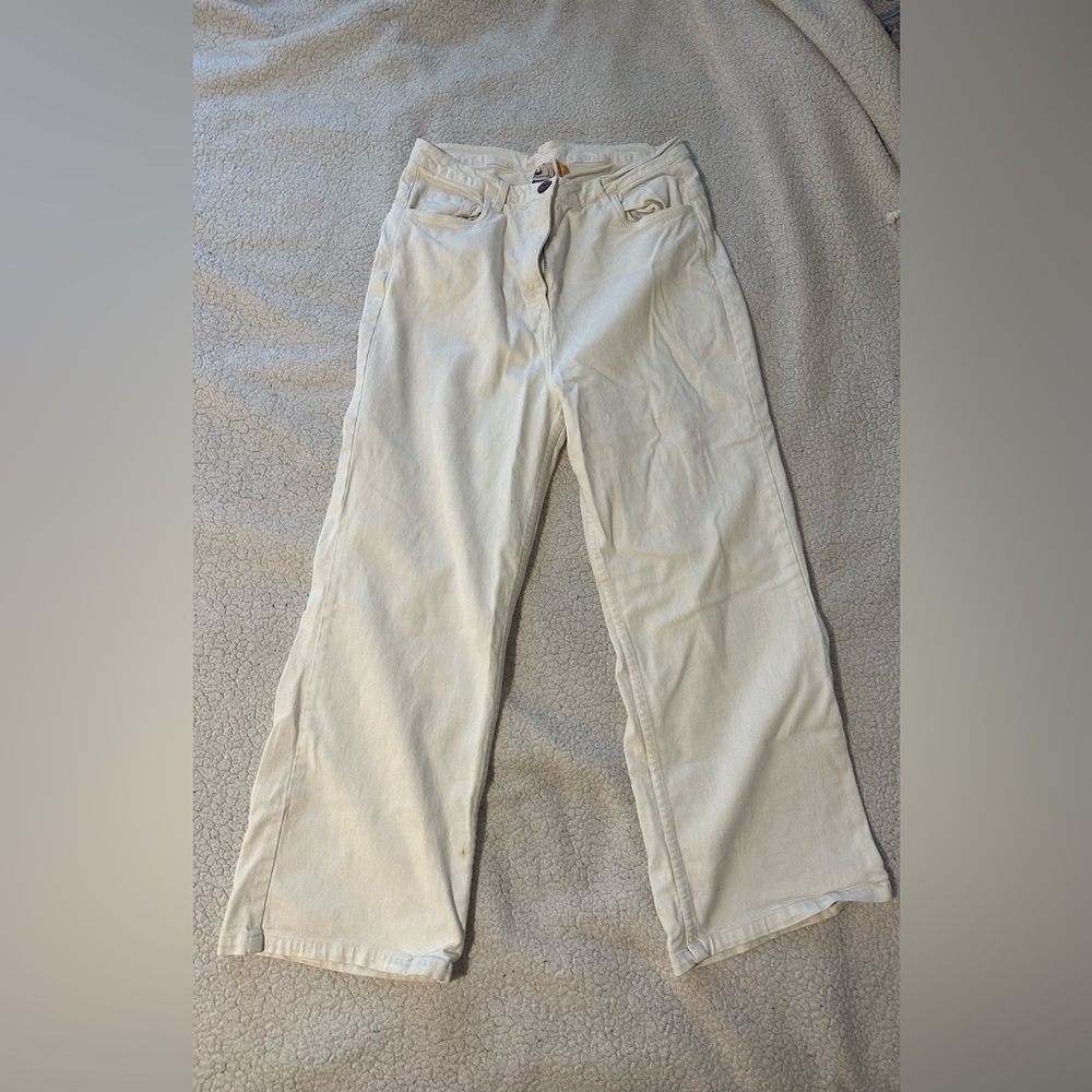 Cream colored high waisted straight legs pants. Semi denim blend.